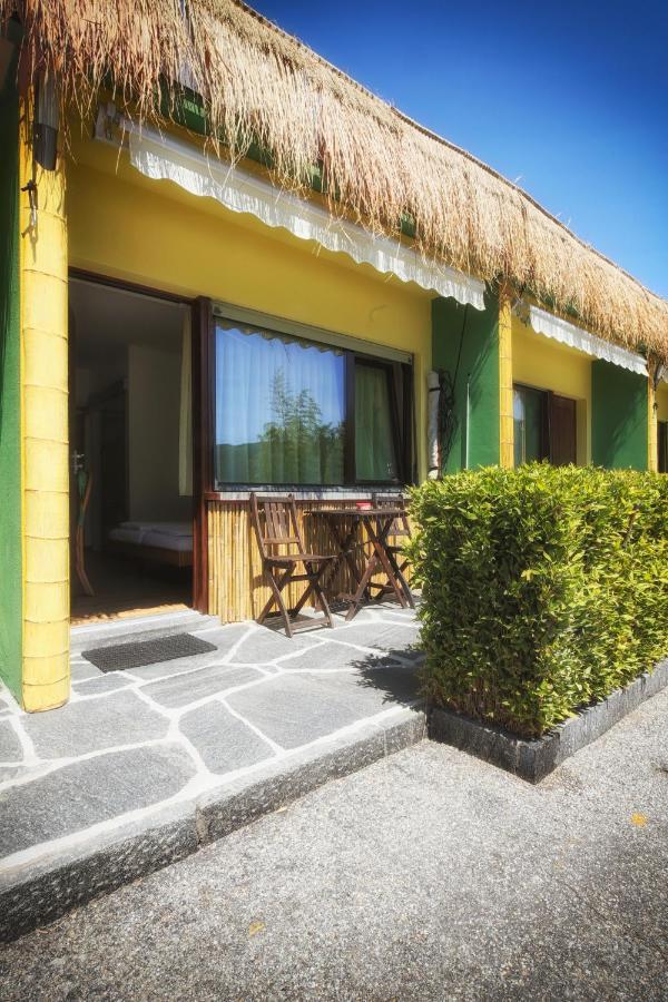 Bamboohouse Motel Riazzino Bagian luar foto